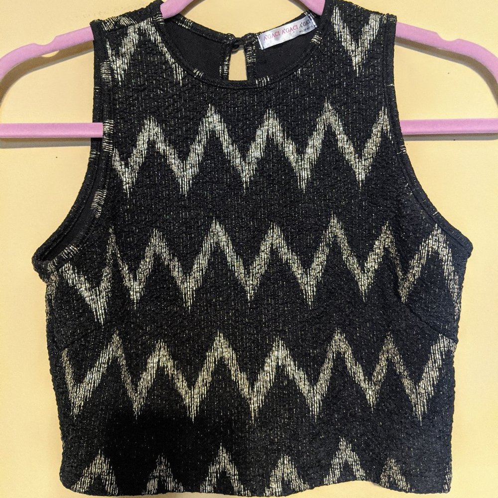 Black and gold going out top